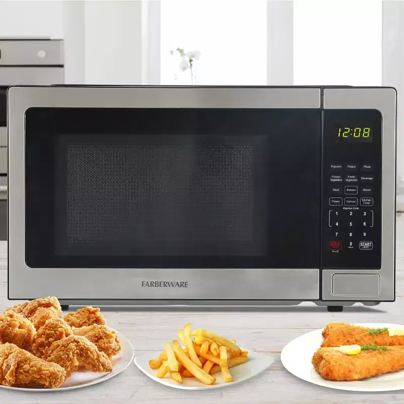 Farberware 1.1 Cu. Ft. Countertop Microwave Oven  1000W Power, Auto Cook Settings, Defrost, and Safety Lock