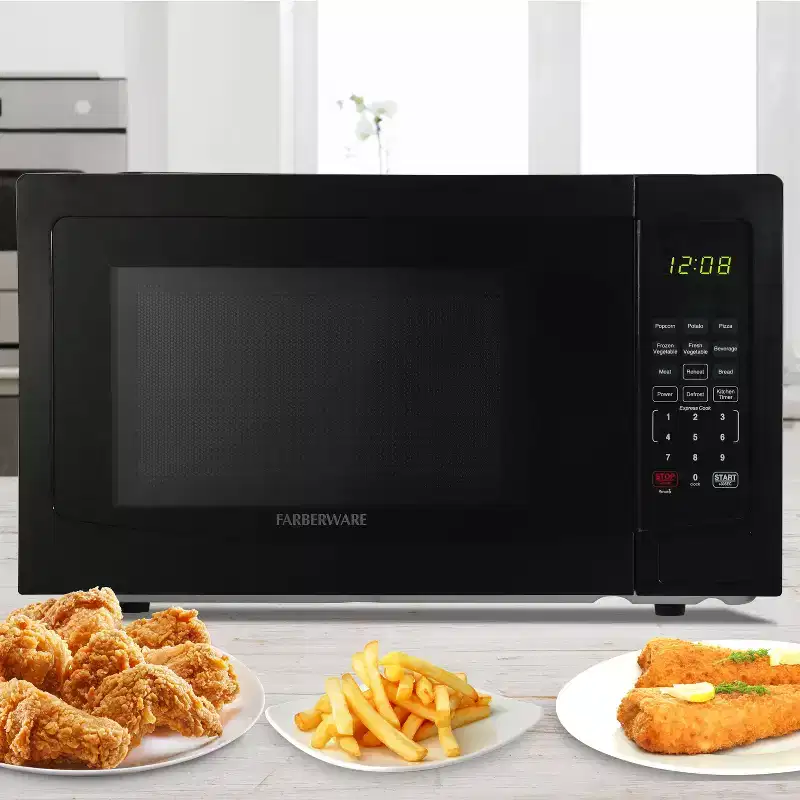Farberware 1.1 Cu. Ft. Countertop Microwave Oven  1000W Power, Auto Cook Settings, Defrost, and Safety Lock