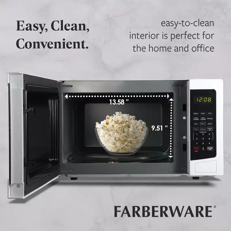 Farberware 1.1 Cu. Ft. Countertop Microwave Oven  1000W Power, Auto Cook Settings, Defrost, and Safety Lock