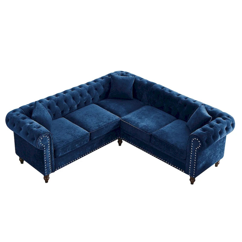 L-shaped sofa with deep-stitched details and curled armrests.