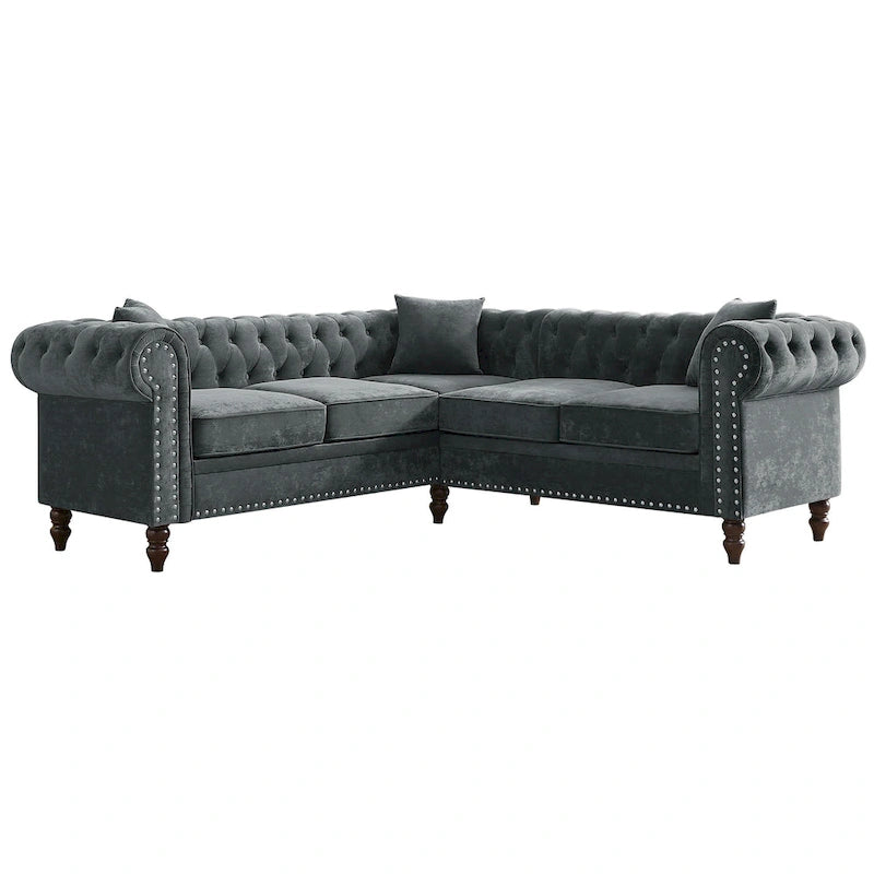 L-shaped sofa with deep-stitched details and curled armrests.
