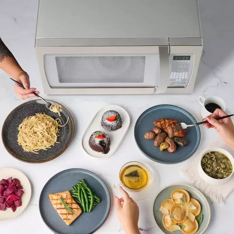 Farberware Professional 1.3 Cu. Ft. 1100-Watt Microwave Oven with Smart Sensor Cooking, White and Platinum